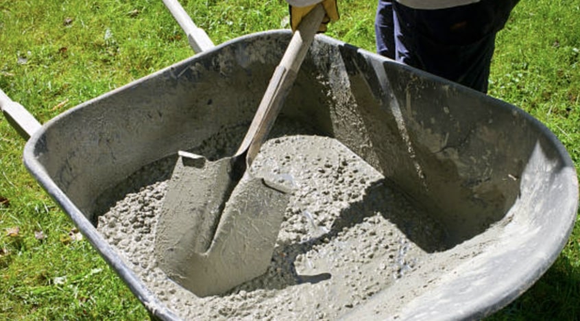 Carefully mix the concrete with water