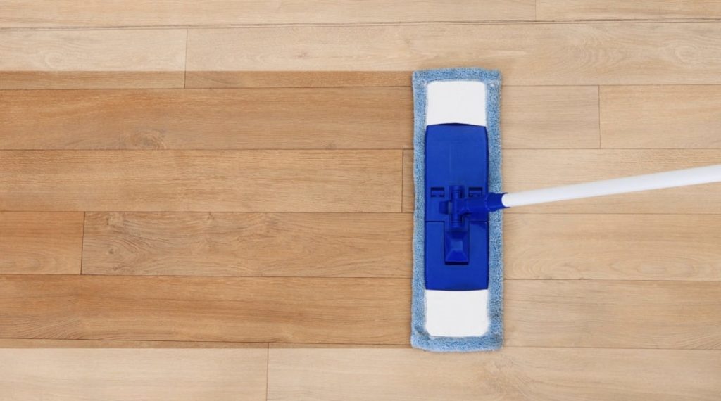 Mop the floor to remove grime